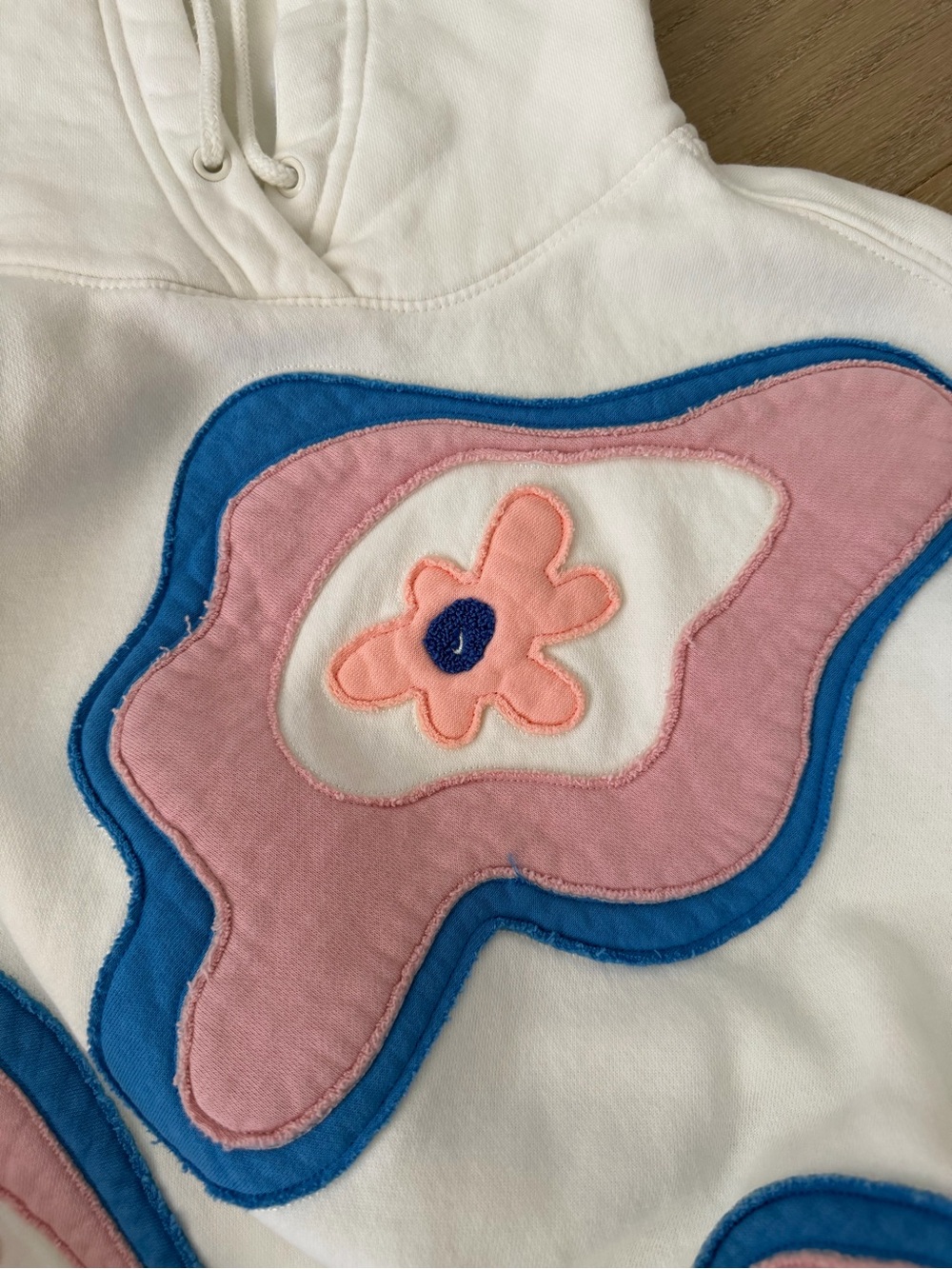 Nike White Athletic Shorts with Pink and Blue Floral Appliqués - Picture 8 of 8